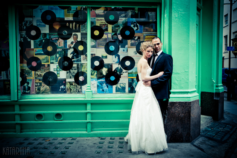 20120110145651-Edit-2 wedding couple posing in front of vinyl record shop